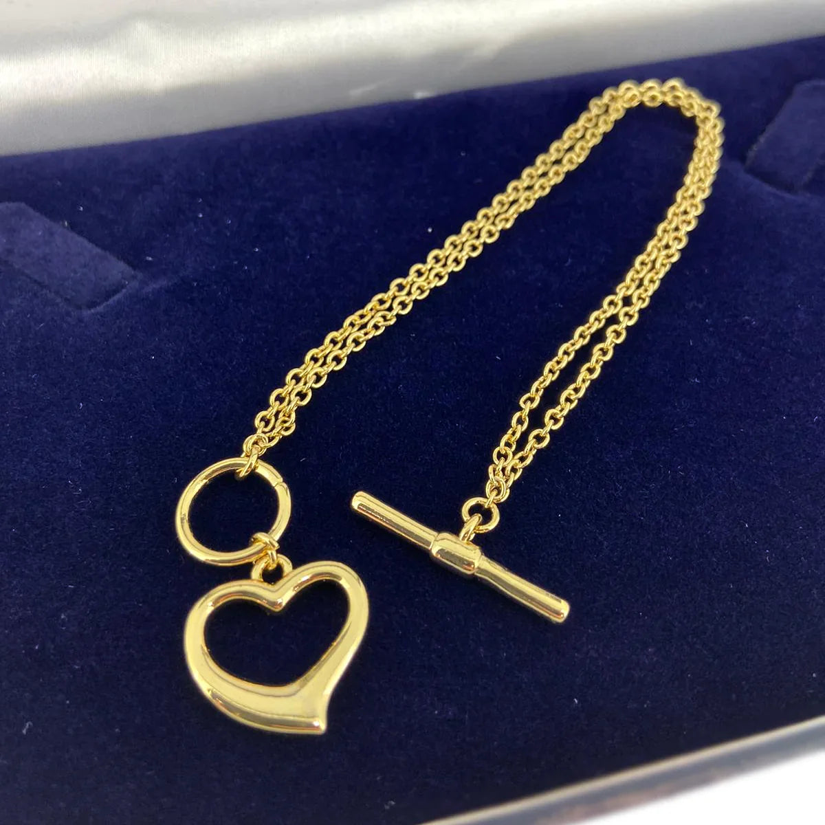GOLD DOUBLE BRACELET WITH HEART CHARM T-BAR